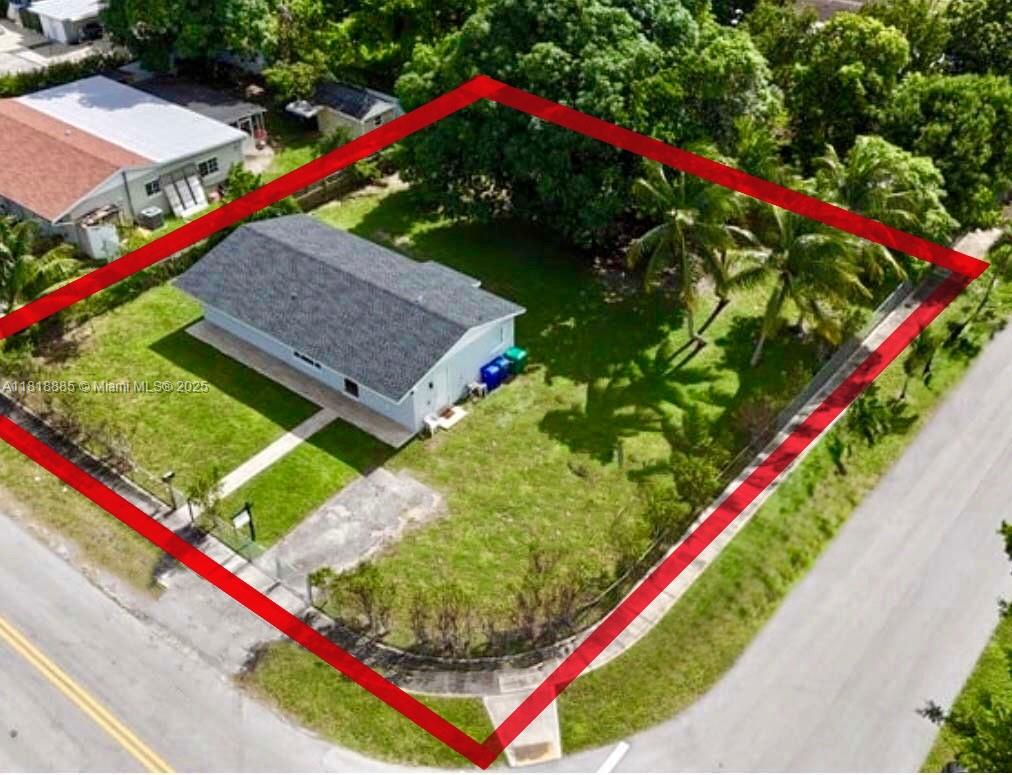 SELLER CONCESSIONS AVAILABLE! Discover Miami Gardens' charming hidden gem! This fantastic corner home is situated on one of the area's largest lots—spanning an impressive 11,500 sqft and brimming with possibilities. It’s perfect for outdoor lovers, offering ample space to park your boats, jet-skis, and cars simultaneously. Recently renovated, this 3-bedroom, 1-bath home boasts an open-concept design, featuring a brand-new kitchen with new stainless-steel appliances, including a washer and dryer. Enjoy modern comforts with new A/C units, a new roof (2023), and an upgraded electrical panel. Ideally located just minutes from the Florida Turnpike, I-95, Palmetto Expressway, St. Thomas University, Jackson North Medical Center, Hard Rock Stadium, supermarkets, airports, and retail stores.