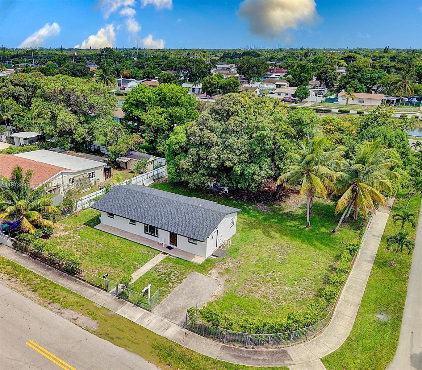 SELLER CONCESSIONS AVAILABLE! Discover Miami Gardens' charming hidden gem! This fantastic corner home is situated on one of the area's largest lots—spanning an impressive 11,500 sqft and brimming with possibilities. It’s perfect for outdoor lovers, offering ample space to park your boats, jet-skis, and cars simultaneously. Recently renovated, this 3-bedroom, 1-bath home boasts an open-concept design, featuring a brand-new kitchen with new stainless-steel appliances, including a washer and dryer. Enjoy modern comforts with new A/C units, a new roof (2023), and an upgraded electrical panel. Ideally located just minutes from the Florida Turnpike, I-95, Palmetto Expressway, St. Thomas University, Jackson North Medical Center, Hard Rock Stadium, supermarkets, airports, and retail stores.