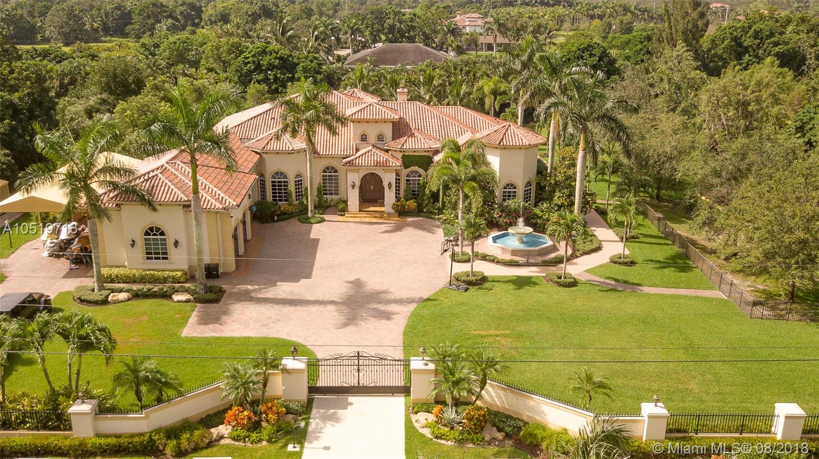 Southwest Ranches Magnificent design with luxurious, elegant details. Exclusive equestrian community in Broward's prime real estate location. Custom built personal residence including RTI smart home system which incorporates full home automation, advanced HD security system, and a Lutron personalized lighting system in the entire home. Spacious family room and state-of-the-art theater room. Oversized bedrooms each with own bathroom and garden view. There is a concrete and iron security gate entrance, pool and jacuzzi, completely fenced and beautifully landscaped exterior. No expense spared!!