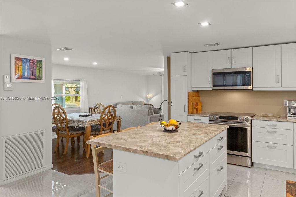 Photo of 5239 NW 3rd Ave, Deerfield Beach, FL 33064 (MLS # A11916928)