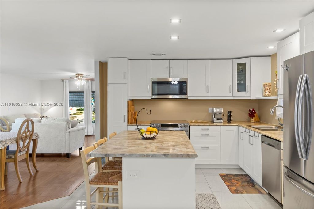 Photo of 5239 NW 3rd Ave, Deerfield Beach, FL 33064 (MLS # A11916928)