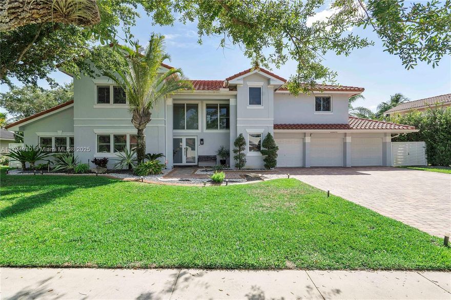 Fall in love with this luxury waterfront two-story dream home, perfectly situated in the prestigious Pasadena Estates community. This 5-bedroom + den, 3-bath pool home boasts over 4,059 sq ft of elegantly updated living space, set on a massive 15,762 sq ft lot—that’s over one-third of an acre. With spacious interiors, serene water views, and a resort-style pool, this exceptional home offers the ultimate in South Florida living.