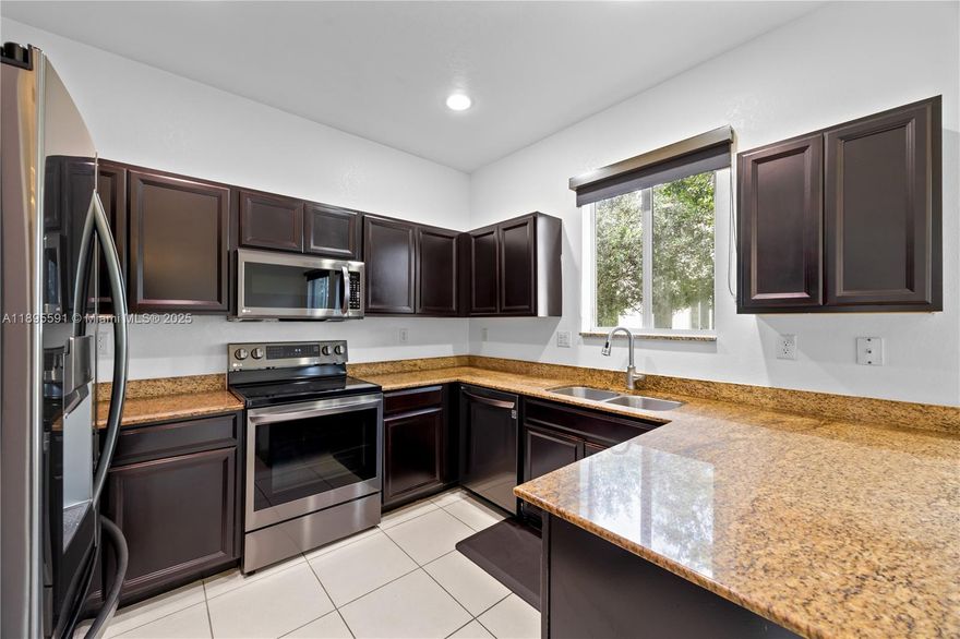 Beautiful 3 Bed/2.5 Bath Townhome in Miami Gardens!
Built in 2016, this spacious townhome located in a desirable community with low HOA fees. Designed for comfort and style, open kitchen, abundant natural light, tile flooring throughout.
SS appliances, W&D, updated bathrooms, modern ceiling lamps, window treatments throughout, tankless water heater, TV in the main bedroom, impact windows & doors throughout the residence w/hurricane shutters.
Beautiful kitchen is perfect for cooking & hosting dinners w/ friends & family, thanks to its open layout and high-quality appliances that make entertaining effortless.
1-car garage & underground utility lines.
Don’t miss this exceptional property — a blend of comfort, functionality, modern living, close to major highways, shopping, and dining.