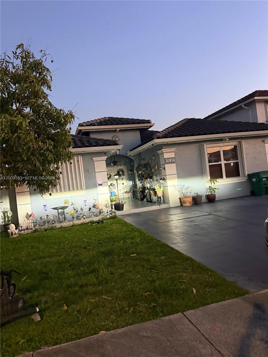 Great 1-story home for large family with 5 bedrooms and 3 bathrooms, a patio with lovely lake view, ceramic tiles throughout. Very close to schools and shops. No HOA.  Refrigerator will be replaced before closing date.