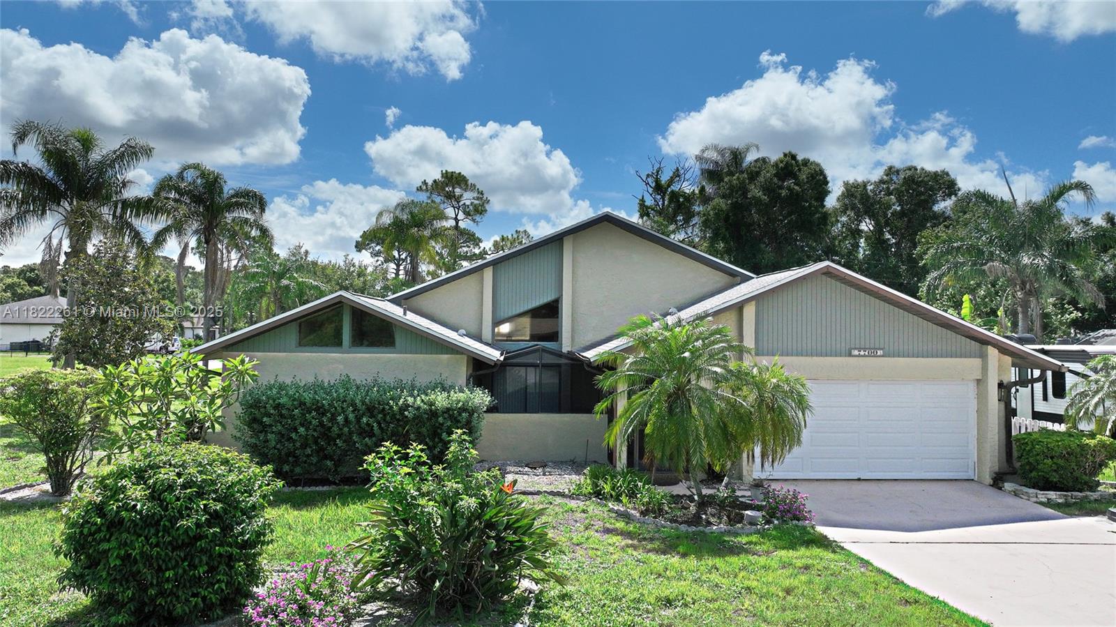 Welcome to Daughtrey's Creek a North Fort Myers treasure! This isn’t just a house it’s your private Florida oasis on a rare half-acre corner lot. From morning coffee on the screened porch to poolside BBQs, every space tells a story of joy. The heart of this incredible pool home is a spacious living room with vaulted ceilings and a chef inspired kitchen perfect for family gatherings. The master suite features new flooring, dual sinks, a walk-in shower, and a spa jacuzzi for serene moments. Fully fenced backyard and sprinkler system for complete peace of mind. With a big storage shed in the back, newer roof, new pool pump, new water heater, new washer, dryer, new tile in one of the other bedrooms and fresh paint. You're getting exceptional value in today's market
