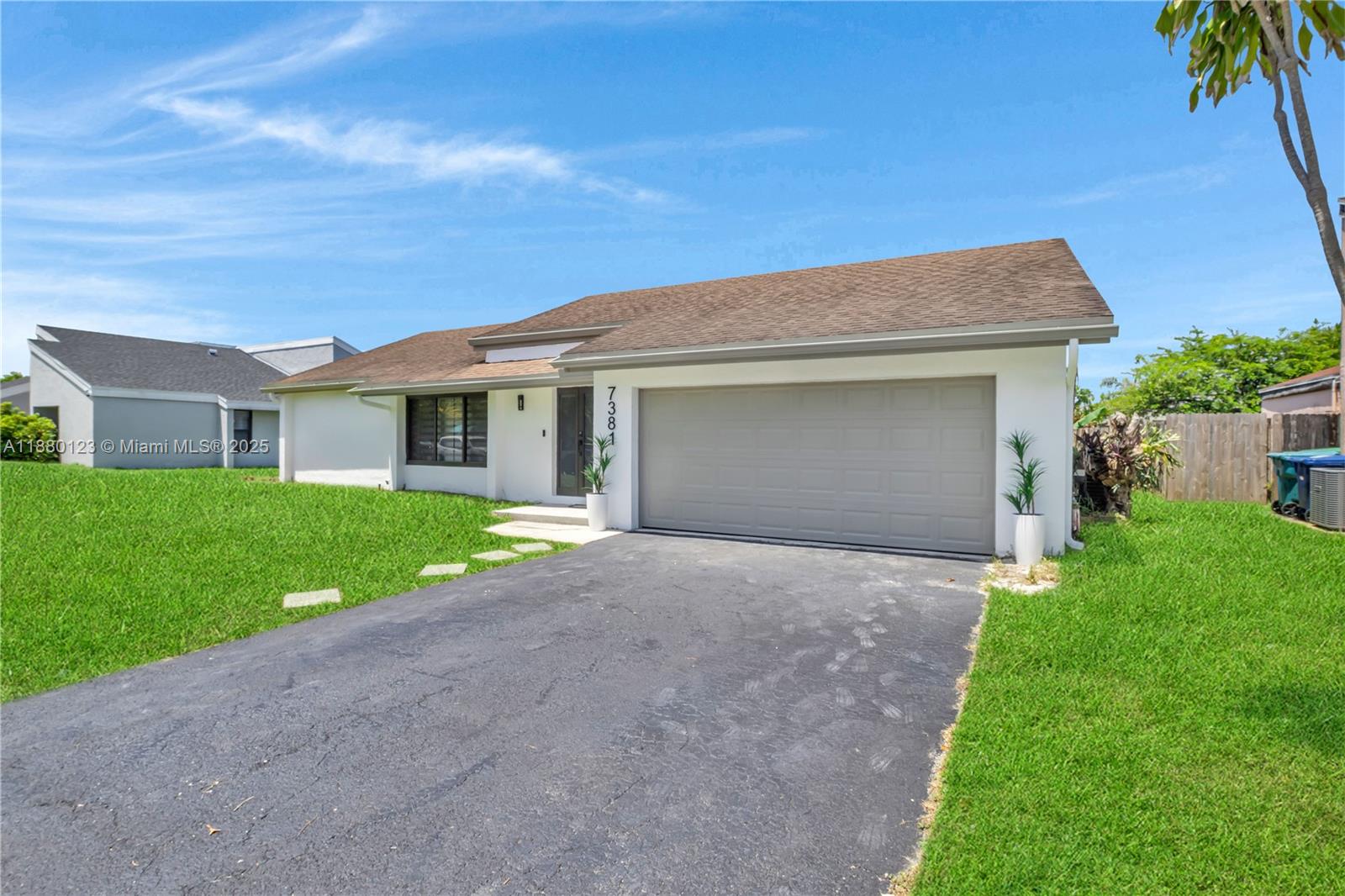 Beautiful, spacious 4 bed/2 bath pool home with 2 car garage located in an all age, family community, with no HOA fees. Relax in your large screened patio area and swim with your family in the pool. All existing patio furniture is included in the sale. The home has stain-stainless appliances, full size washer/dryer, updated light fixtures, ceiling fans, and large neutral porcelain tile flooring in the main living areas and wood laminate in the bedrooms. Great location with nearby shopping & dining! Hurry before it's gone!