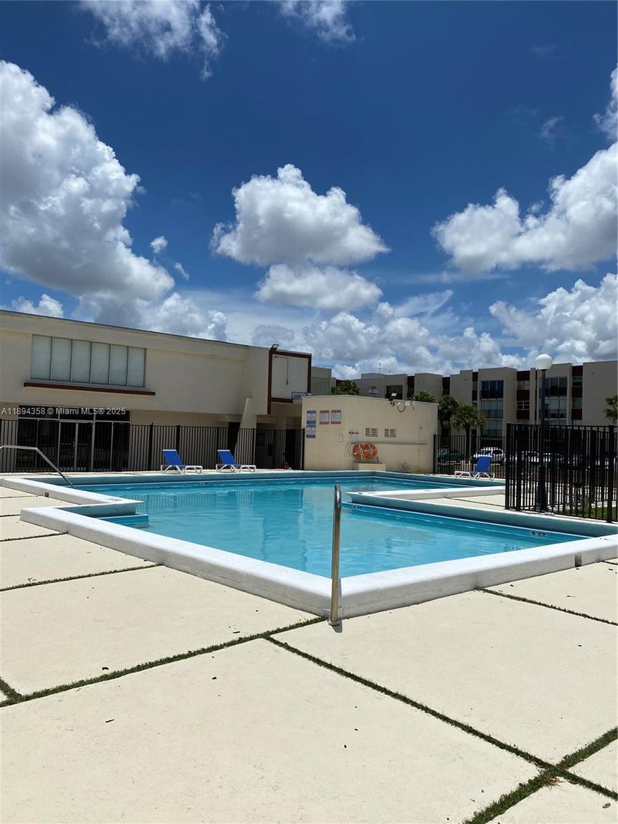Central located unit ready to move in, great condition. 2/2 + den on the first floor, very well maintained and great condition washer and dryer inside the unit. Hurricane accordion shutter. This gated community offers: pool, tennis, basketball and playground. Located near Florida International University (FIU), schools, Dolphin mall, shopping centers & public transportation.