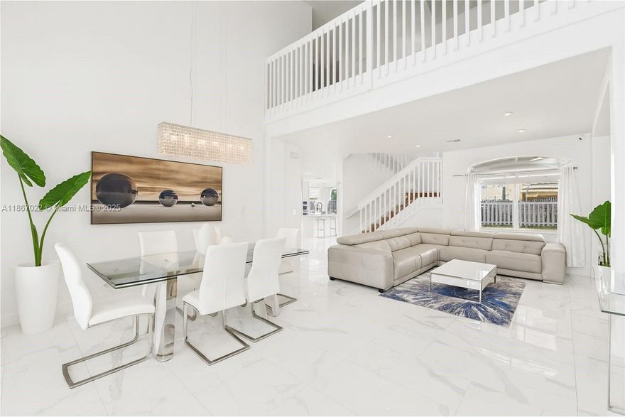 Beautifully renovated Cantamar home in Cutler Bay! This inviting property showcases stylish upgrades and premium finishes. The open-concept living space is ideal for gatherings, with a modern kitchen featuring high-end appliances, custom cabinetry, and sleek countertops. The master suite offers a tranquil escape with a redesigned bathroom and walk-in closet. The large backyard is perfect for outdoor entertaining and has space for a pool. The second floor includes impact windows for added peace of mind. Buyers can opt to assume the solar panel loan, enhancing energy efficiency. This home is a rare find, blending comfort and sophistication in a desirable location. Don’t miss out!