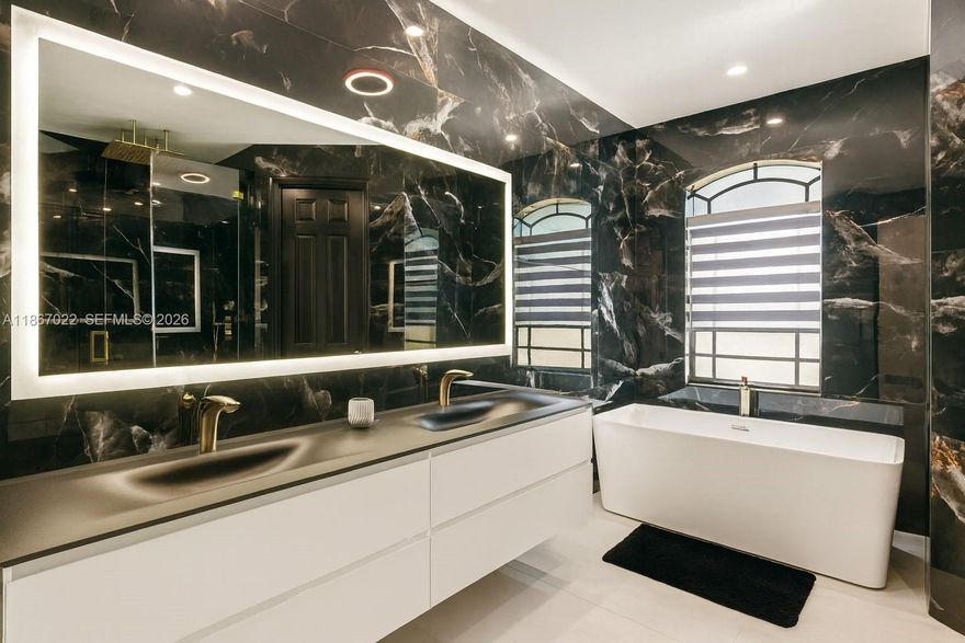 Beautifully renovated Cantamar home in Cutler Bay! This inviting property showcases stylish upgrades and premium finishes. The open-concept living space is ideal for gatherings, with a modern kitchen featuring high-end appliances, custom cabinetry, and sleek countertops. The master suite offers a tranquil escape with a redesigned bathroom and walk-in closet. The large backyard is perfect for outdoor entertaining and has space for a pool. The second floor includes impact windows for added peace of mind. Buyers can opt to assume the solar panel loan, enhancing energy efficiency. This home is a rare find, blending comfort and sophistication in a desirable location. Don’t miss out!