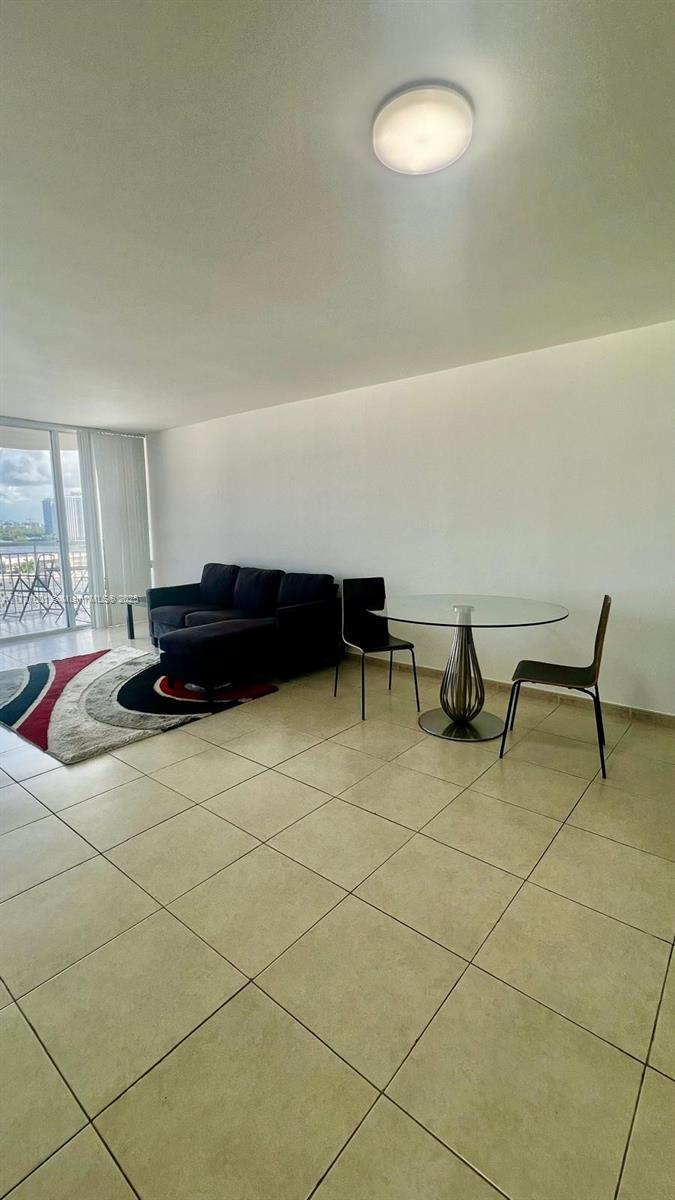 Enjoy a wide bay view from this large, well-laid-out 1 bedroom with a guest bathroom. The entrance leads into the kitchen and dining/living area all with the same view of the wide bay. The spacious bedroom includes a well-appointed bathroom with shower/tub and toilet area separate from the vanity/basin for privacy and convenience. The generous terrace is ideal for relaxing or enjoying a meal as the sun rises or sets over the wide bay. A rare covered parking space comes with the unit.