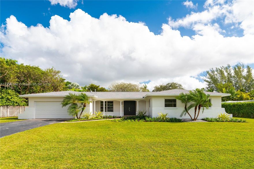 This beautiful home in Pine Shore has been freshly spruced up and is ready to move in! Situated at the end of a quiet cul-de-sac, the neighborhood is a 10! Just painted both inside and out in light neutral tones, other updates include a new roof, new Lennox HVAC, new refrigerator, updated electrical, and new washer/dryer. Newly landscaped front garden with new sprinkler system and private and fenced back yard with more than enough room for a pool. The kitchen adjoins a large family room with plenty of space for gatherings that can expand into the screened lanai. Spacious living and dining rooms complement the 4 generous sized bedrooms with excellent storage. Two car garage. A Very Special Home!