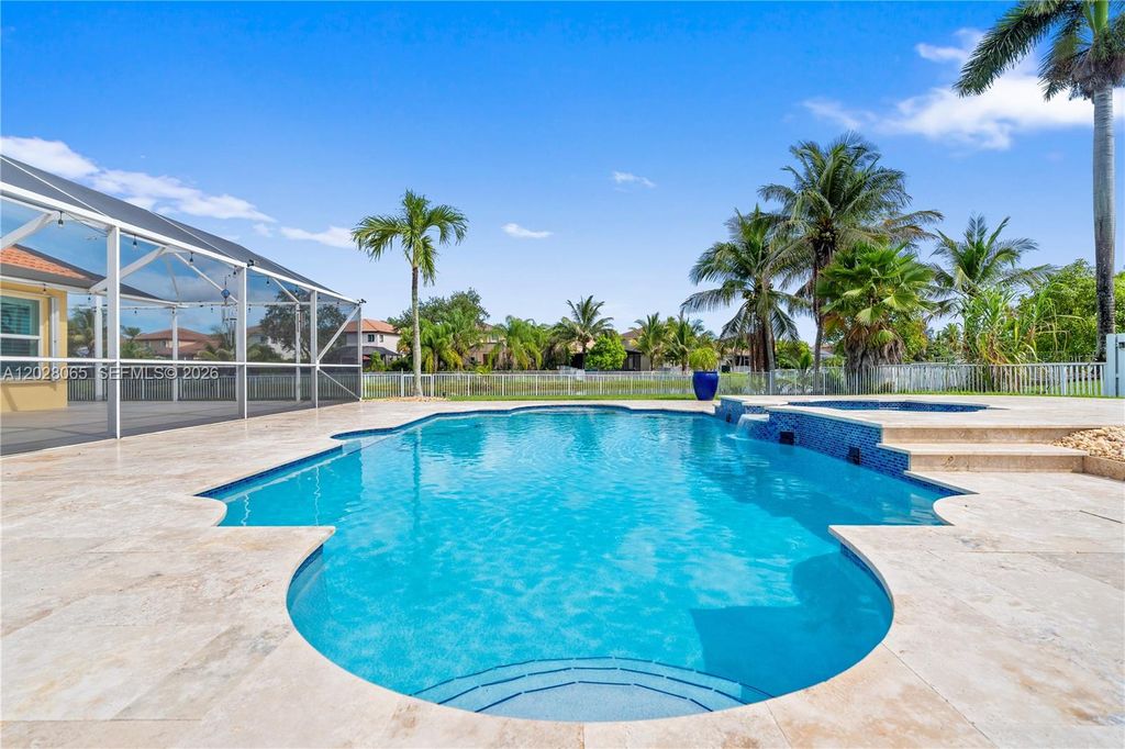Photo of 1090 NW 192nd Ave, Pembroke Pines, FL 33029 (MLS # A12028065)
