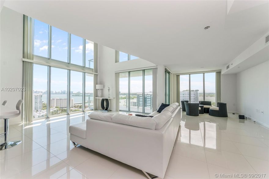 Stunning 270 degree views from two-story dream penthouse in the sky. Over 2,500 square feet of interior living space plus multiple balconies afford priceless skyline and water vies from every room. Three bedrooms, each with en suite baths, family room, dining room, wonderful kitchen. 3 assigned, adjacent parking spaces.