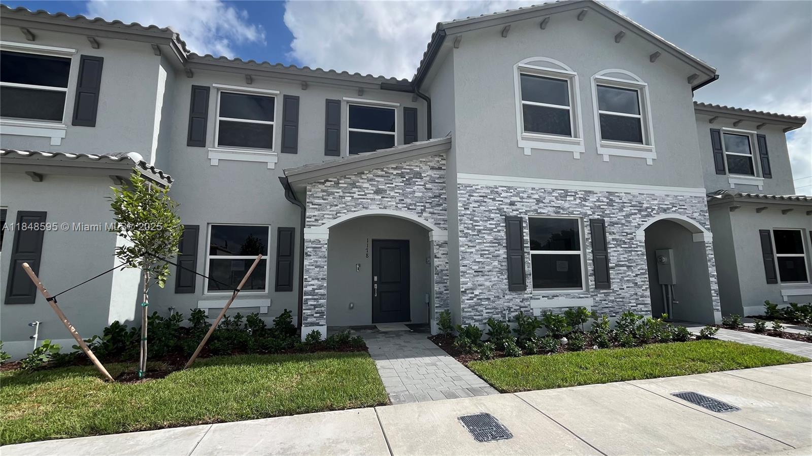 ONLY TWO MONTHS TO MOVE IN!!! Enjoy modern living in this brand-new villa in Le Jardine, Florida City's newest development. This spacious 2-story home features an open-concept kitchen with quartz countertops, stainless steel appliances, and plenty of cabinet space.The property includes a washer and dryer, private fenced patio, and two parking spaces, plus ample guest parking. High-speed internet is included. Ideally located just minutes from the Turnpike, US-1, Publix, Baptist Hospital, Amazon Centers, Homestead Air Reserve Base and schools. Don't miss your chance to live in a modern, well-connected home with comfort and convenience at its core.