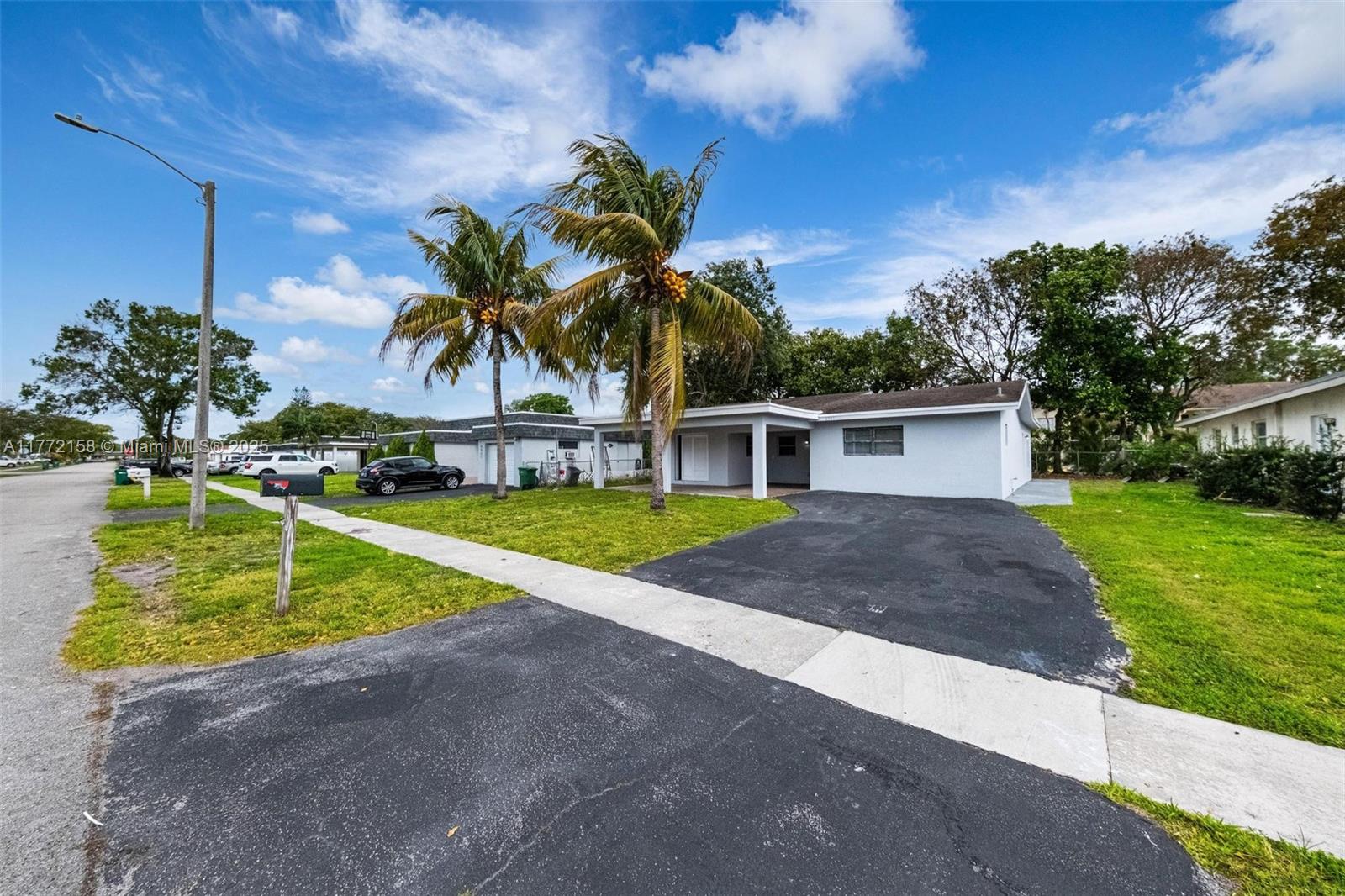 Property for Sale at 6941 Nw 84th St, Tamarac, Broward County, Florida - Bedrooms: 3 
Bathrooms: 2  - $450,000