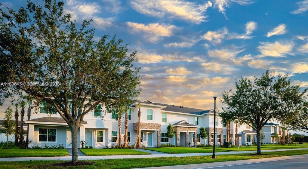 Photo of 10241 SW Newberry Ave #C1, Port St Lucie, FL 34987 (MLS # A11888434)