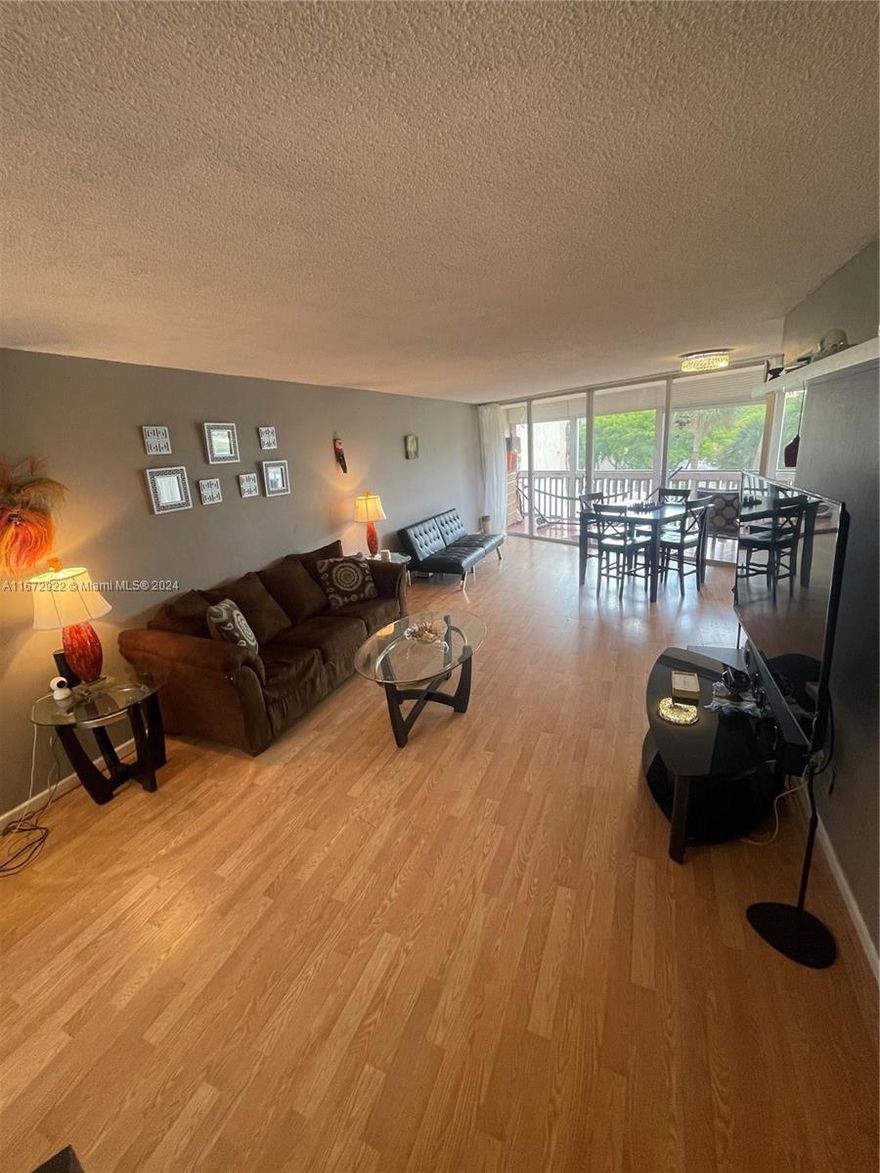 BELOW MARKET PRICE! BRING AN OFFER! Welcome to this spacious and move-in-ready 2-bedroom, 2-bathroom corner condo at Environ in Lauderhill! Enjoy added privacy in this pristine unit, featuring an expansive balcony with shutters—perfect for morning coffee or evening relaxation. The building is financially sound with reserves, meaning no upcoming assessments and ease for buyers looking to finance. 680 Credit score and income of $40,000/owner or $60,000/family.

This turnkey condo comes with two parking spaces, including a corner covered spot for larger vehicles, and offers the convenience of a guard-gated entry and a secure lobby. Perfect for singles or families, this clean and move-in-ready unit is waiting for you!