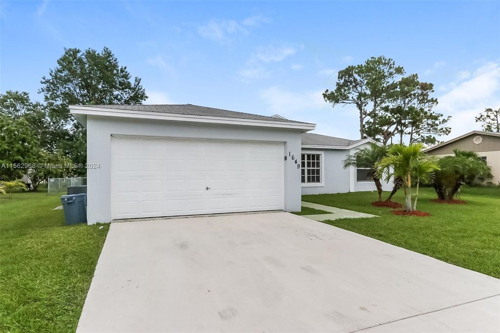 Photo of 1649 SE Floresta Dr, Port Saint Lucie, FL 34983 (MLS # A11562968)