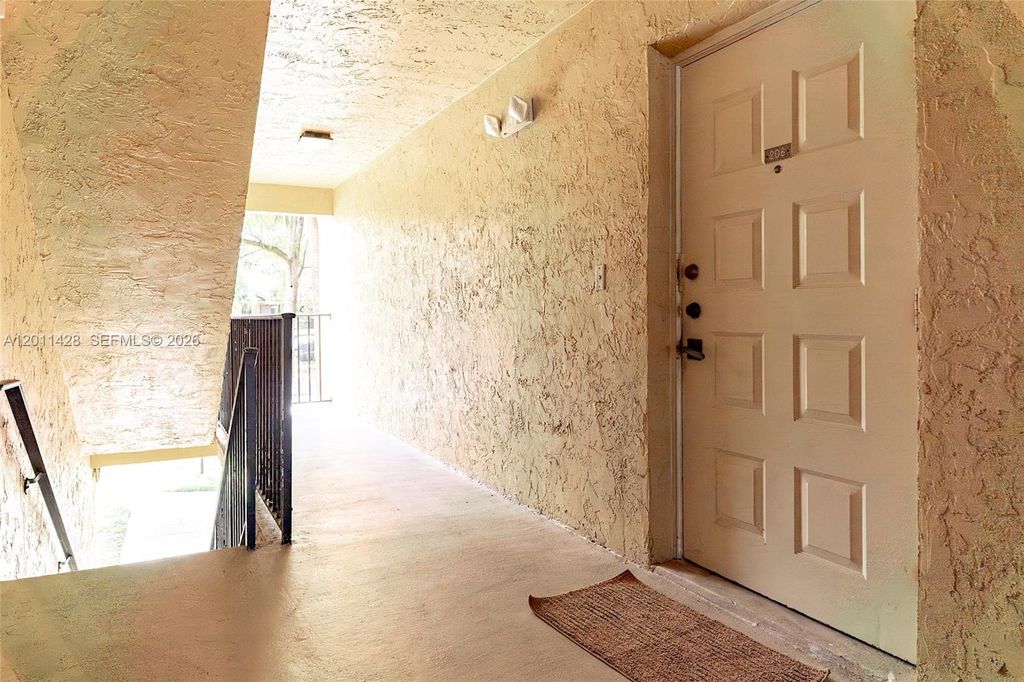 Photo of 3083 N Oakland Forest Dr #206, Oakland Park, FL 33309 (MLS # A12011428)