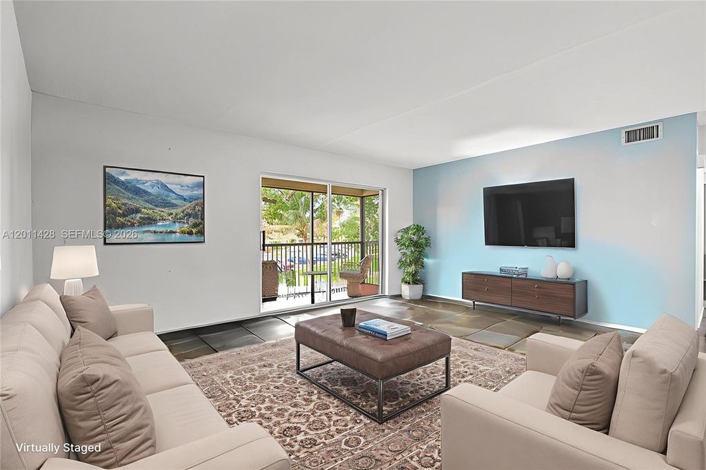 Photo of 3083 N Oakland Forest Dr #206, Oakland Park, FL 33309 (MLS # A12011428)