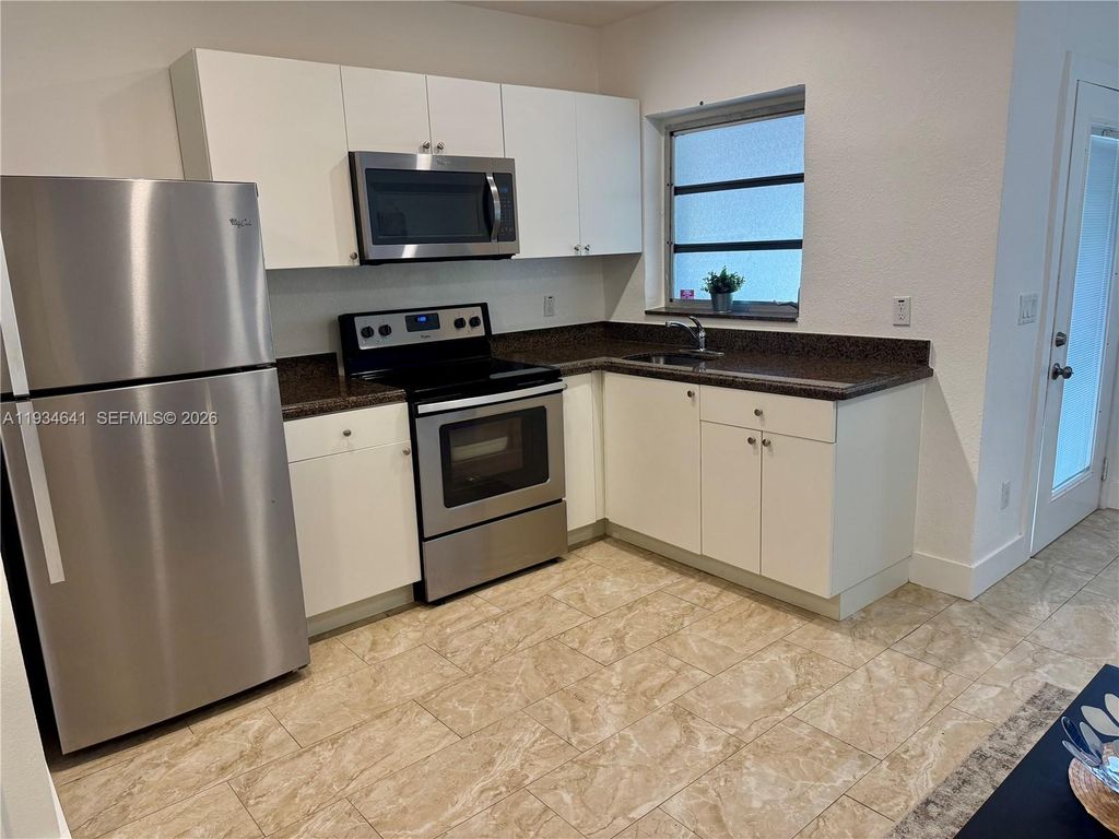 Photo of 1648 Washington St #1-2, Hollywood, FL 33020 (MLS # A11934641)