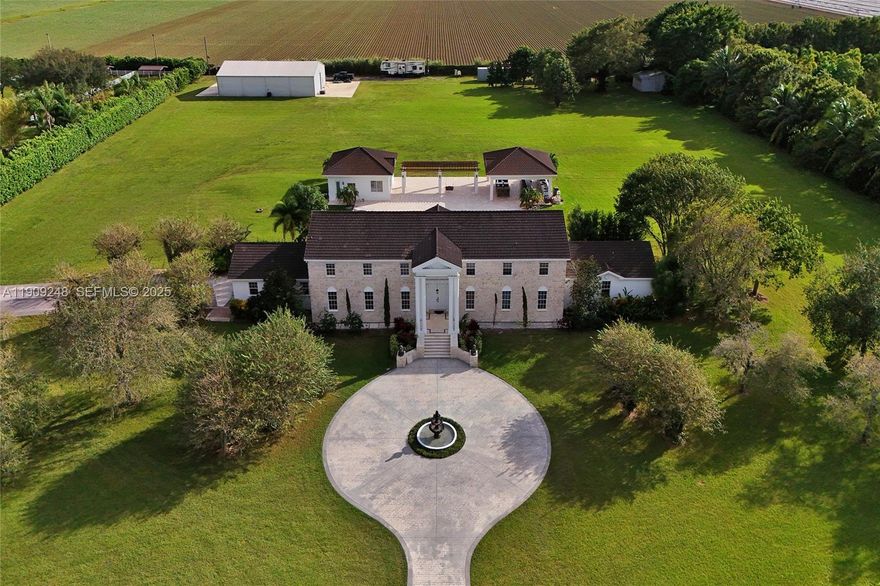 Welcome to Lindbergh’s Landing where elegance and luxury meet on 6.25 acres in one of South Florida’s most exclusive private enclaves. This architectural masterpiece features 23-ft ceilings, marble finishes, and expansive open living spaces that exude modern sophistication. The 4BR/3.5BA main home offers a large open floor plan with upstairs den, Additionally separate 2BR/1BA guest residence with full kitchen and laundry. Enjoy your own private resort with tropical landscaping, manicured grounds, and a 1BR/1BA cabana apt with full kitchen for guests. The state-of-the-art “Ultimate Man Cave” provides endless possibilities for private jets, exotic cars, or equestrian pursuits. The community offers a 7,000-ft private runway-a lifestyle without boundaries where the sky is truly the limit.