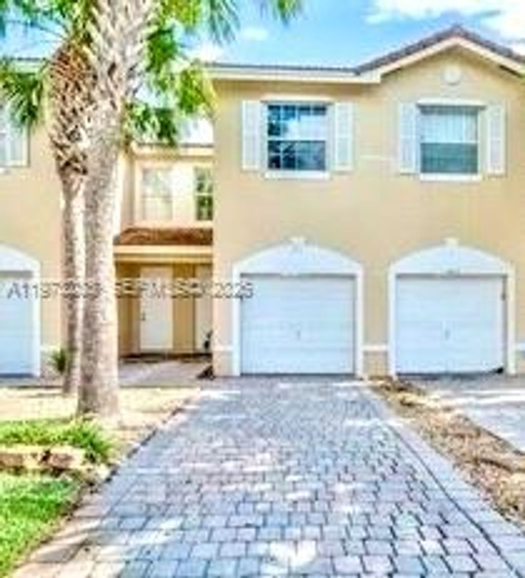 Photo of 6368 Landings Way, Tamarac, FL 33321 (MLS # A11973208)