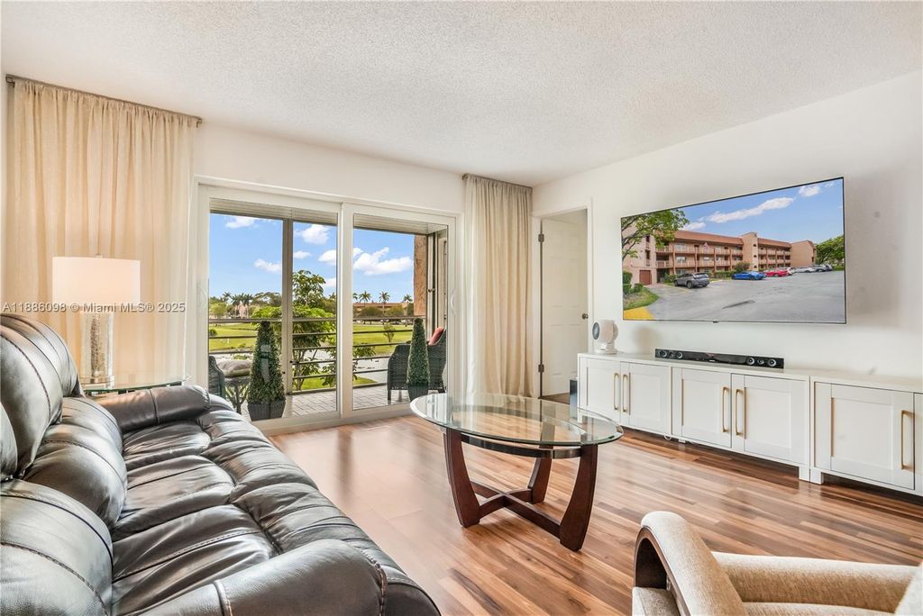 Photo of 9841 Sunrise Lakes Blvd #307, Sunrise, FL 33322 (MLS # A11886098)