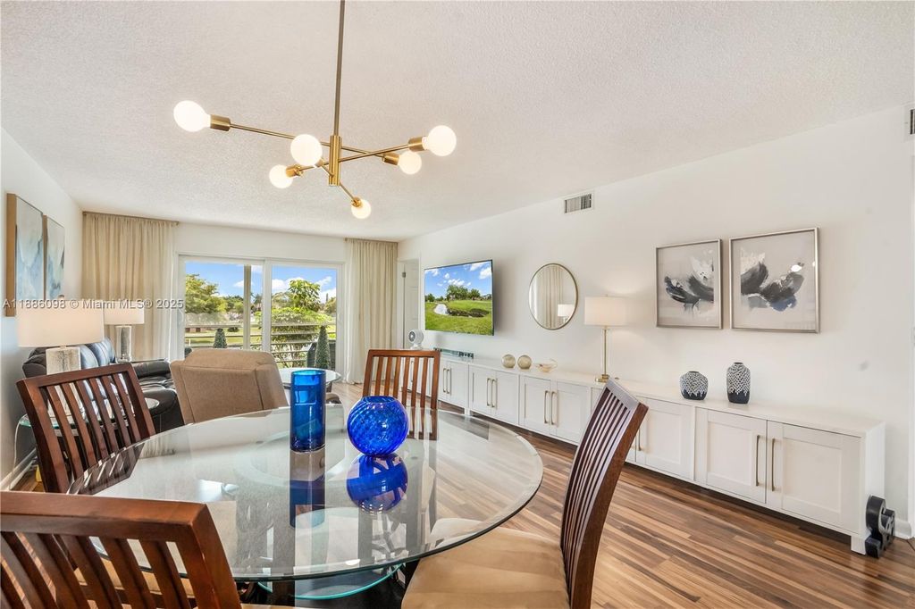 Photo of 9841 Sunrise Lakes Blvd #307, Sunrise, FL 33322 (MLS # A11886098)