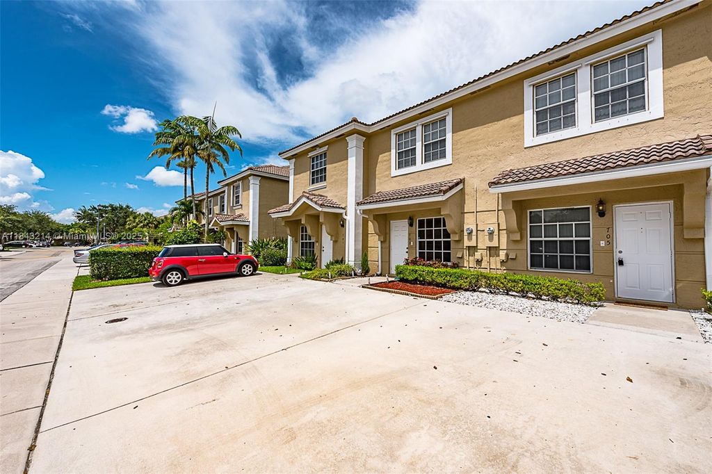 Photo of 705 SW 122nd Ave #705, Pembroke Pines, FL 33025 (MLS # A11843214)