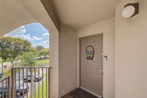 Photo of 1200 SW 137th Ave #301E, Pembroke Pines, FL 33027 (MLS # A11968227)