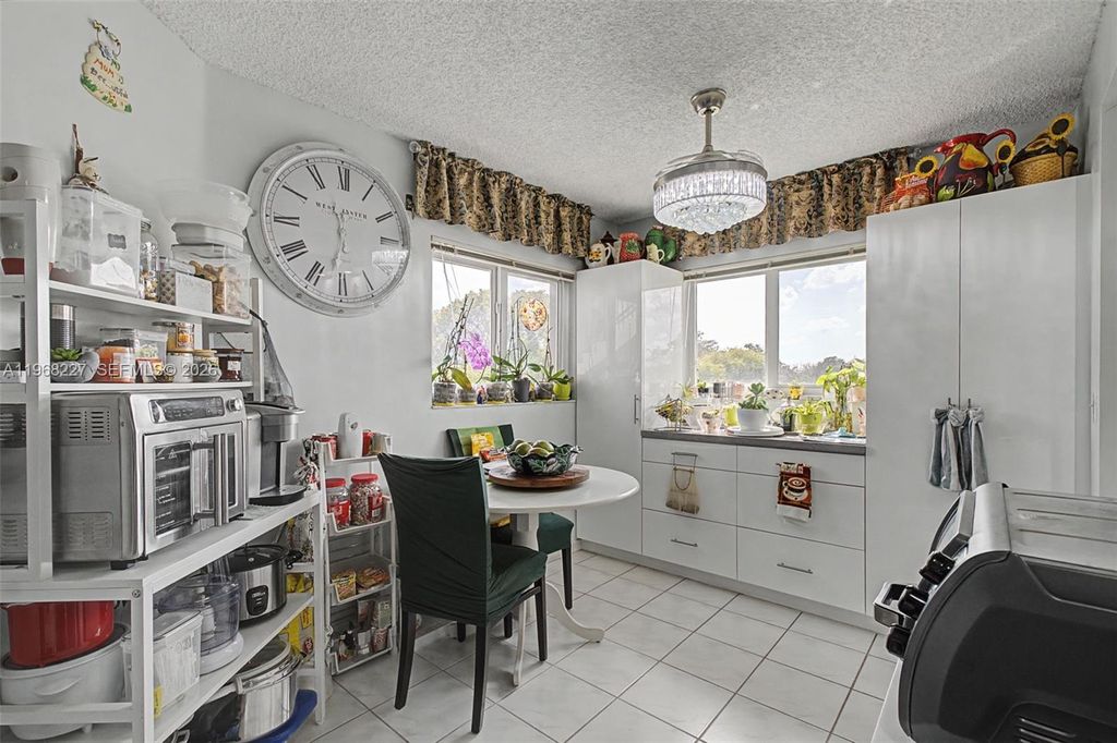 Photo of 1200 SW 137th Ave #301E, Pembroke Pines, FL 33027 (MLS # A11968227)