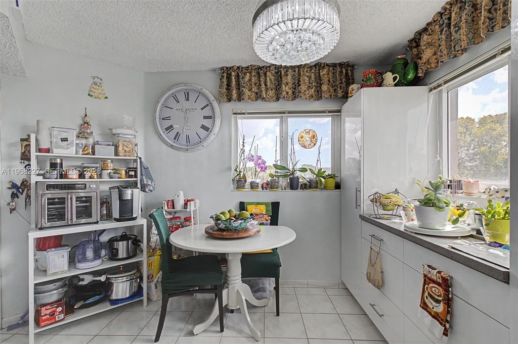 Photo of 1200 SW 137th Ave #301E, Pembroke Pines, FL 33027 (MLS # A11968227)