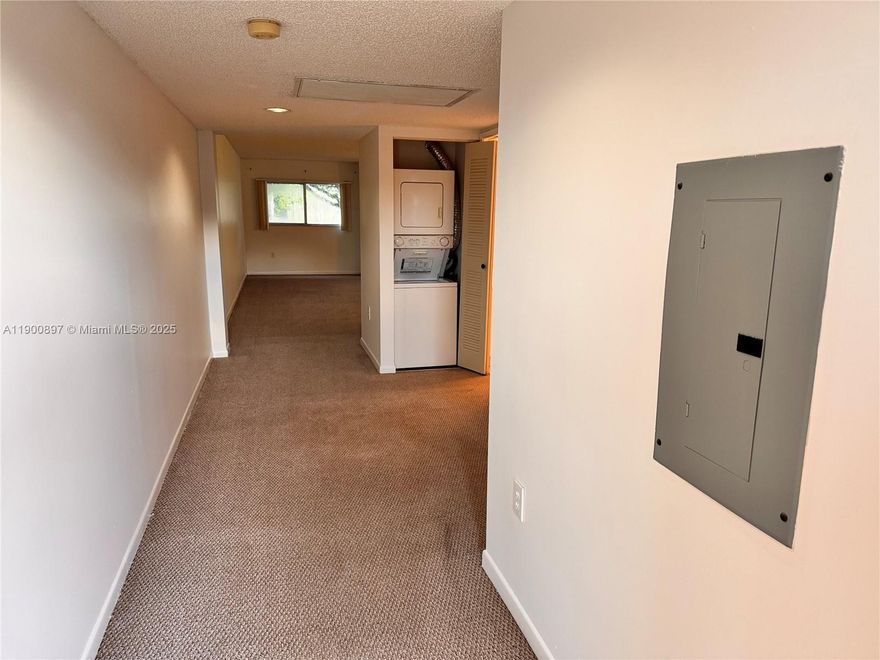 Internet, basic cable, and most amenities are included in this pristine and cozy condo! This spacious 1-bedroom, 1.5-bath unit offers 1,056 sq. ft. of comfortable living space. Features include a well-kept kitchen with appliances, an open living and dining area, and neutral colors throughout that enhance the natural lighting. The unit is fully handicap accessible and includes a washer and dryer inside for added convenience. Enjoy plush polyester carpet flooring and a ceiling fan in the master bedroom for comfort. Located in Century Village Pembroke Pines, one of the most exclusive 55+ communities in South Florida, residents enjoy resort-style amenities—a million-dollar clubhouse, fitness centers, movies, transportation, free golf, pharmacy, café, 24-hour security patrol, and much more!