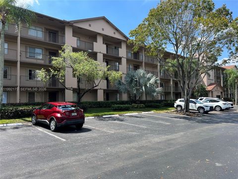 Photo of 12550 SW 15 St #106E, Pembroke Pines, FL 33027 (MLS # A11992173)