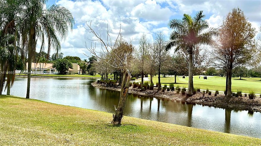 *Beautiful unit in a premium location**. Enjoy a great unobstructed view of the lake and golf field from your backyard. Spacious layout, bright - with a lot of natural light. A bonus den-open office allows you to have a designated home office or a relaxing sitting area. Make yourself comfortable contemplating the peaceful water view from your windows. The unit is private, and the access at the back of the building makes this location quiet and peaceful. Freshly painted throughout, the bathroom and the main room have just been updated. New wood-like floors in the bedroom; the shower/tub combination was renewed and new plumbing was installed. The community has a manager on site, great amenities, beautiful gardens, a clubhouse, gym, business room, pool, and much more.