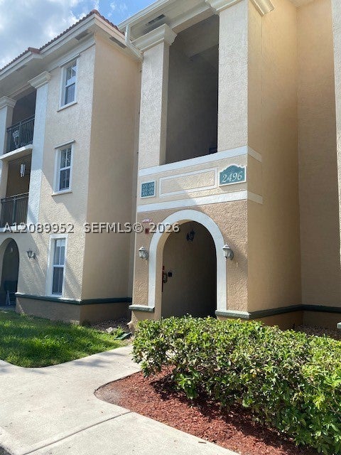 Photo of 2496 Centergate Dr #201, Miramar, FL 33025 (MLS # A12089952)