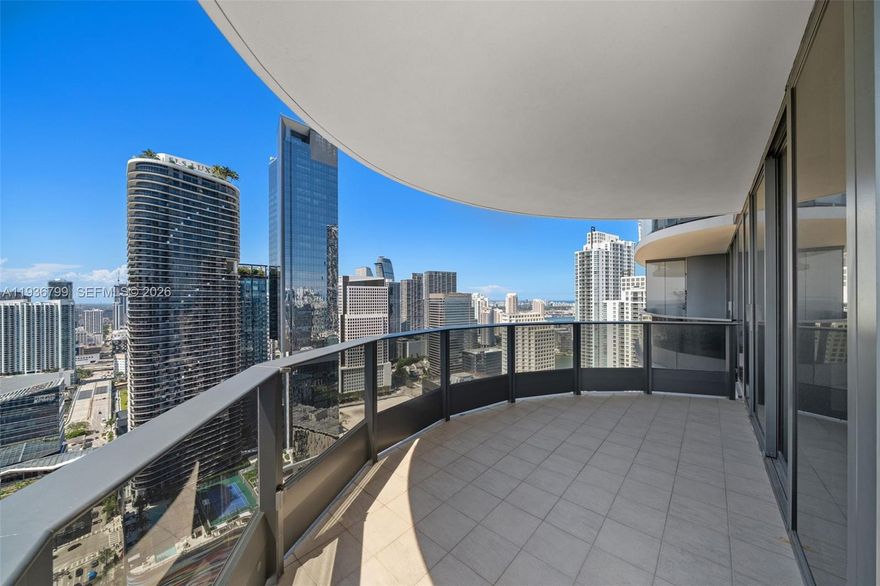 Residence 4212 at Flatiron Brickell offers refined living in the heart of Brickell with sweeping skyline views and a wraparound balcony. This 2-Bed + Den corner residence features a chef’s kitchen with custom Italian cabinetry and Miele appliances, an expansive open living room, a primary suite with a private balcony and a walk-in closet with built-ins, and floor-to-ceiling windows throughout. This residence comes with 1 assigned parking space and 1 valet. Residents of Brickell Flatiron enjoy premier amenities including a 64th-floor sky pool, rooftop spa and fitness center, lap pool, theater, business center, valet, concierge, and 24-hour security, all within walking distance to Brickell City Centre, shopping, and world-class dining.