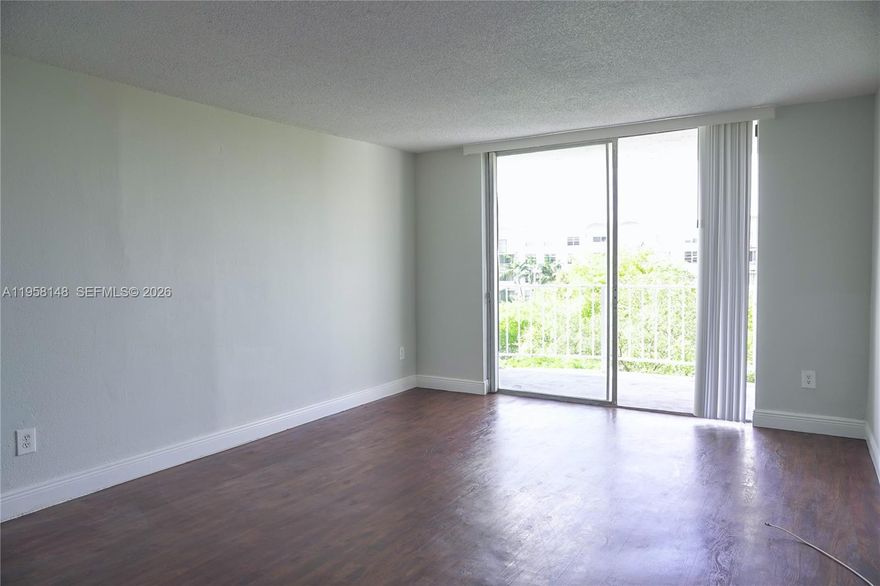 Location, Location.. in a safe gated community. Only available unit with 2 assigned parking spaces! (a rare find). Upgraded kitchen, NEW AC UNIT! ,Bright and Spacious and large balcony with a beautiful green view. Pet-friendly. Condo in continued improvement, NO Carpet -Tile on Hallways. Fumigation is done Every Month. Close to major highways, local shops, and restaurants. Owner motivated! Will consider all offers. TEXT Listing Agent and use Showing Assist.