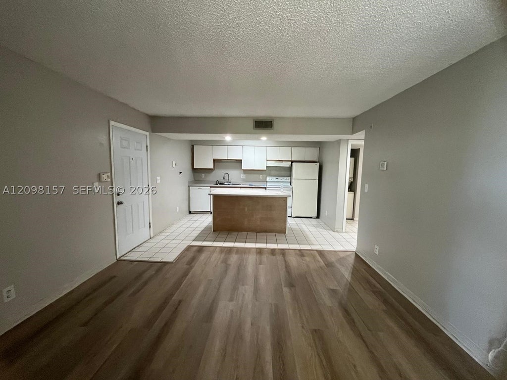 Photo of 4055 W Mcnab Rd #H203, Pompano Beach, FL 33069 (MLS # A12098157)