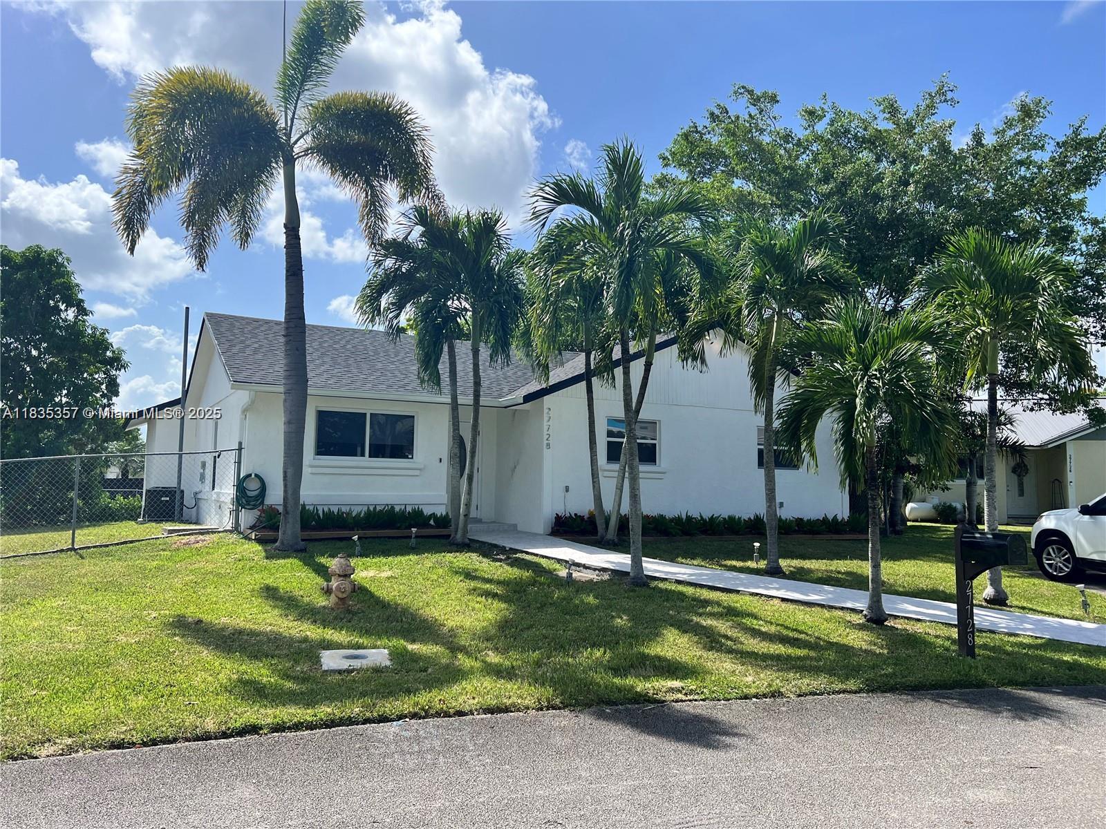 Beautifully remodeled 3/2 smart home with large fenced corner lot. All brand new appliances, kitchen, and
bathrooms with beautiful finishes, granite countertop. Large pantry and new washer dryer inside the home. Lots of
storage. New roof, hurricane windows. Security lights and camera.Mango and Mamey trees. Must see. Application
required.