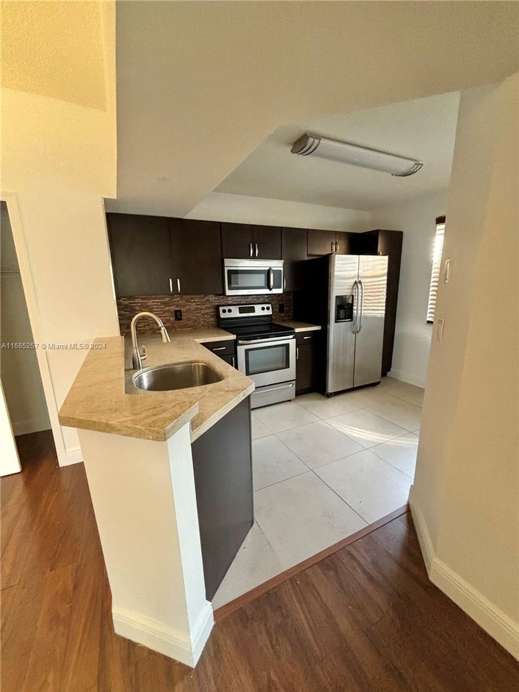 Photo of 8955 Wiles Rd #201, Coral Springs, FL 33067 (MLS # A11685257)