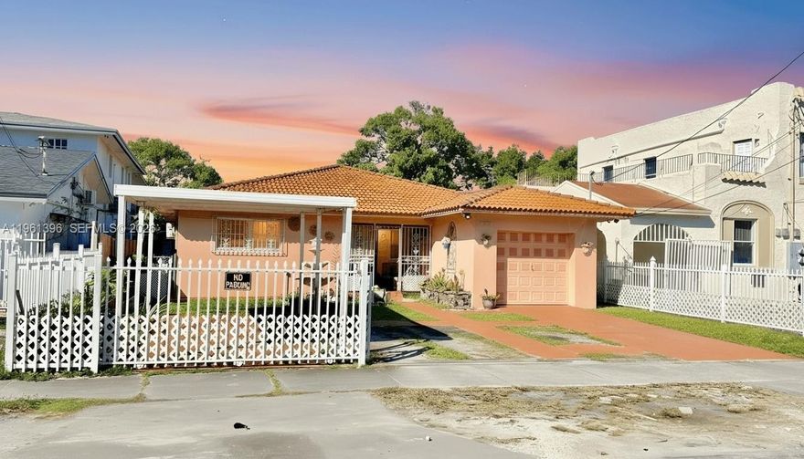 Nestled in the vibrant heart of Little Havana, this 1989-built property presents a unique opportunity. Situated on a 7,000 sq. ft. lot, the home offers 2,100 sq. ft. of living space, featuring four bedrooms and four full bathrooms. As a fixer-upper, this residence holds immense potential for the right buyer or family to customize with cosmetic upgrades. The interior's open layout provides endless possibilities for redesign. A standout feature is the versatile floor plan, which includes two income-producing units while preserving the property's original character. This configuration allows for a private primary residence separate from guest or rental spaces. The home is equipped with wood kitchen cabinets, PVC plumbing, and a roof in excellent condition. The spacious, fully concreted backyard is a blank canvas awaiting transformation into a beautiful outdoor oasis. Positioned in a highly sought-after, no-flood zone neighborhood, this property is surrounded by long-term neighbors. Its central location offers convenient access to Miami's key destinations, including MIA, Miami Beach, Downtown, Brickell, Wynwood, Coconut Grove, and the Civic Center. This is a rare opportunity to acquire a gem in a prime Miami location.