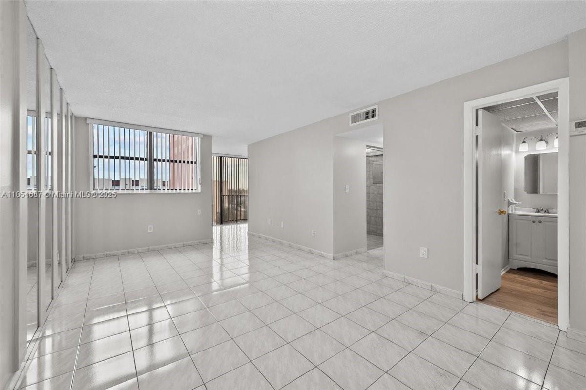 Welcome to this well-appointed top-floor condo offering comfort and convenience. The 2-bedroom, 1.5-bath condo is freshly painted and features tile flooring throughout, abundant natural light, and city views. The kitchen has ample cabinet space and a brand-new appliance set. There's an in-unit washer/dryer and a brand-new water heater! Enjoy access to community amenities including a pool, gym, tennis and basketball courts, playground, clubhouse, and assigned parking. Rent includes water, sewer & garbage. Located just minutes from shopping, dining, and major highways. Easy to show!