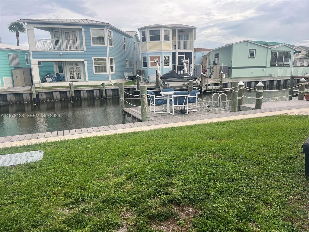 Photo of 2064 Nettles Blvd, Jensen Beach, FL 34957 (MLS # A11978128)