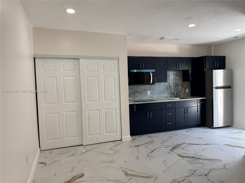 Photo of 9675 NW 19th Pl #0, Sunrise, FL 33322 (MLS # A12017407)