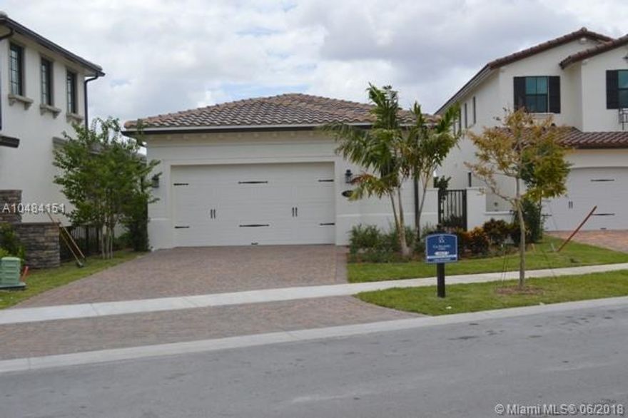 From the moment you enter into this bright, and spacious single house you will want it to become your home. A lot of upgrades in bathrooms and kitchen including KitchenAid appliances, double oven, quartz counter top, kitchen island, porcelain floor, preset connectors for TV, surround system, and alarm system. Impact windows and doors. Front and back water views. Two car garage. Gated community already operating. Great school district and location. You just will fall in love with this beauty!