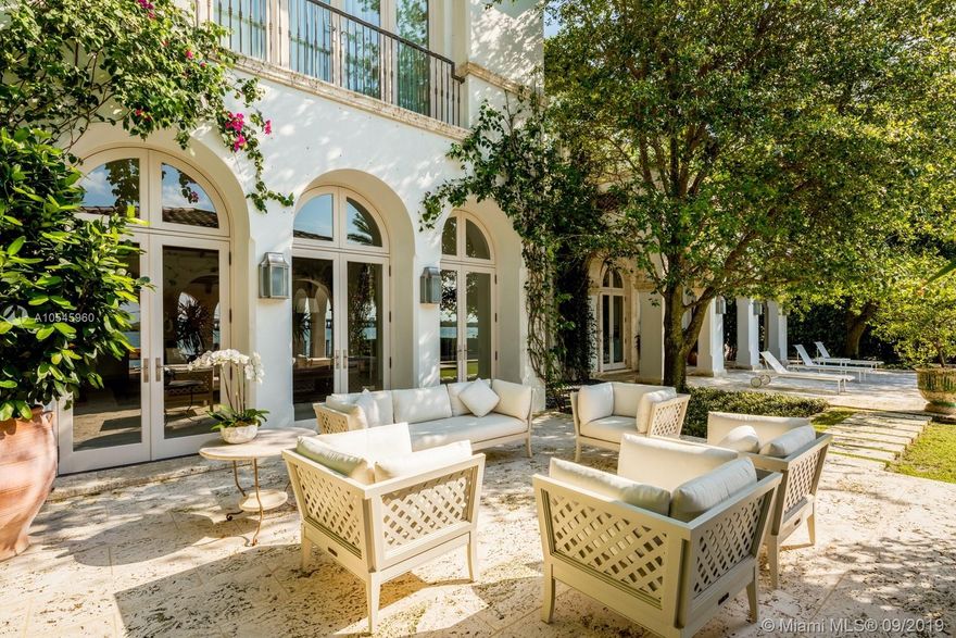 Impeccable waterfront estate located in the heart of Miami Beach on desirable Sunset Island I. This meticulously curated property is the epitome of luxury with 116 ft of waterfrontage, 6 bedrooms, 7 full and 3 half bathrooms, summer kitchen, saltwater pool and spa, and endless water views throughout. Exquisite soaring archways frame large living and multiple dining/entertaining spaces. The gourmet eat-in chef’s kitchen features top of the line stainless steel appliances, double  islands and opens into the spacious family room. Enjoy tranquil water views from the master suite complete with hardwood floors, two spacious walk-in closets and serene master bath with dual vanity and soaking tub. Additional features include library/office, 2 car garage and separate guest house.