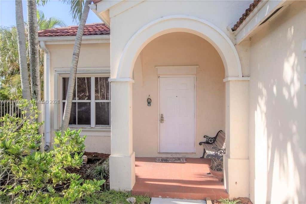 Photo of 777 Tanglewood Cir, Weston, FL 33327 (MLS # A12018039)
