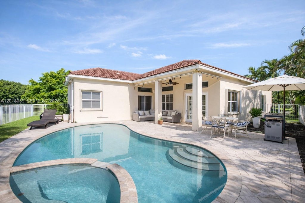 Photo of 777 Tanglewood Cir, Weston, FL 33327 (MLS # A12018039)